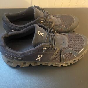 On clouds black running shoes